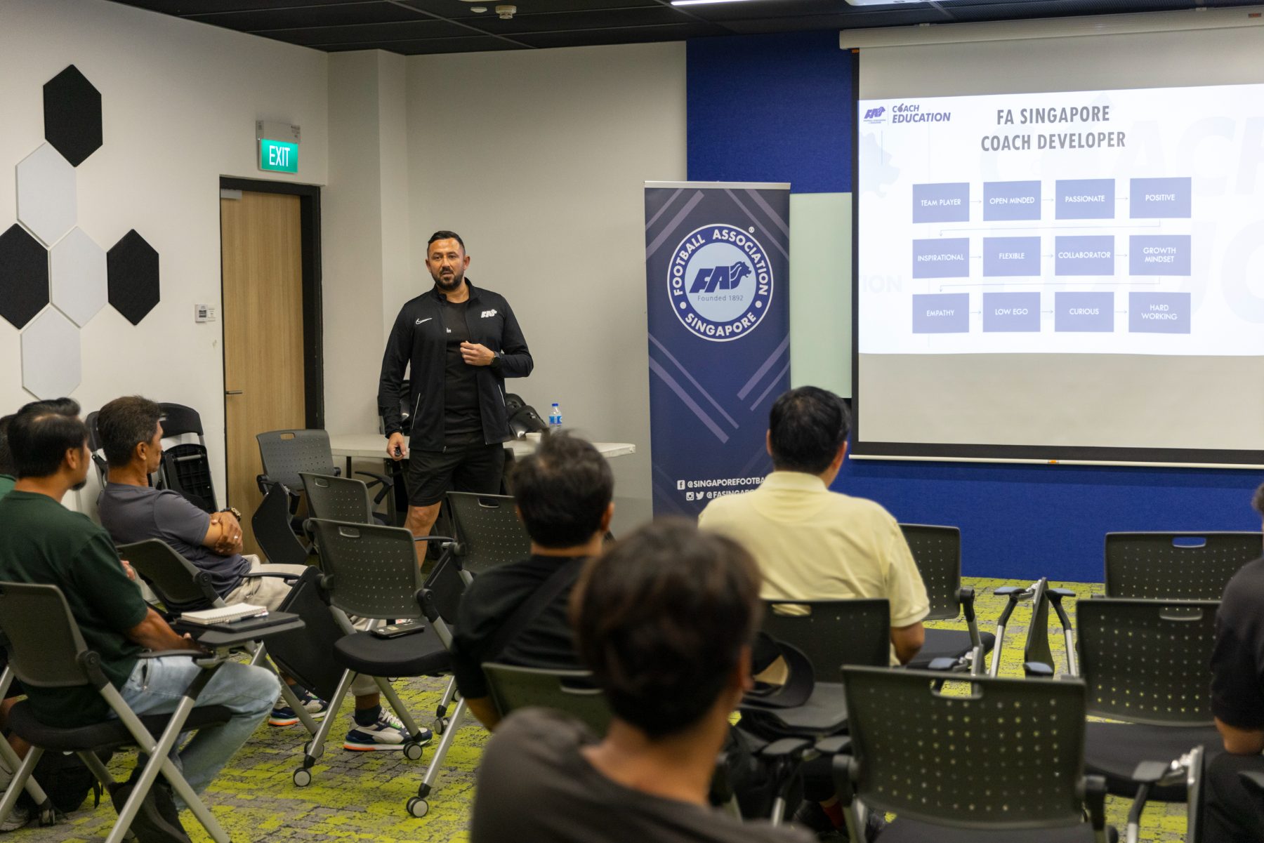 Hasney delivering a coach-education insight session at the Football Association of Singapore